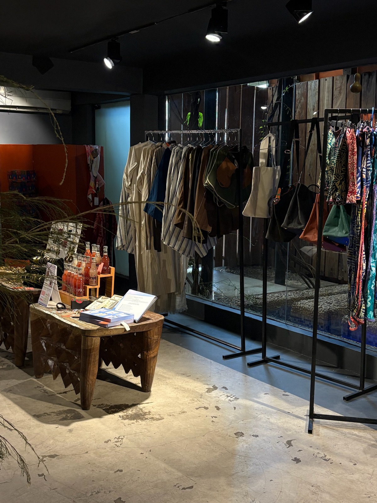 Curated fashion racks and styled tables at an EBBE pop-up
